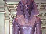 British Museum Top 20 19-1 Amenophis III Seated Statue 19. Amenophis III Seated Statue, Thebes Egypt, about 1400BC. In room 4 there are two 3m high seated statues in black granite of Amenophis III (also spelled Amenhotep). Amenhophis III was the first Egyptian King to be worshipped as a god in his own lifetime. Here is a full view of one of them